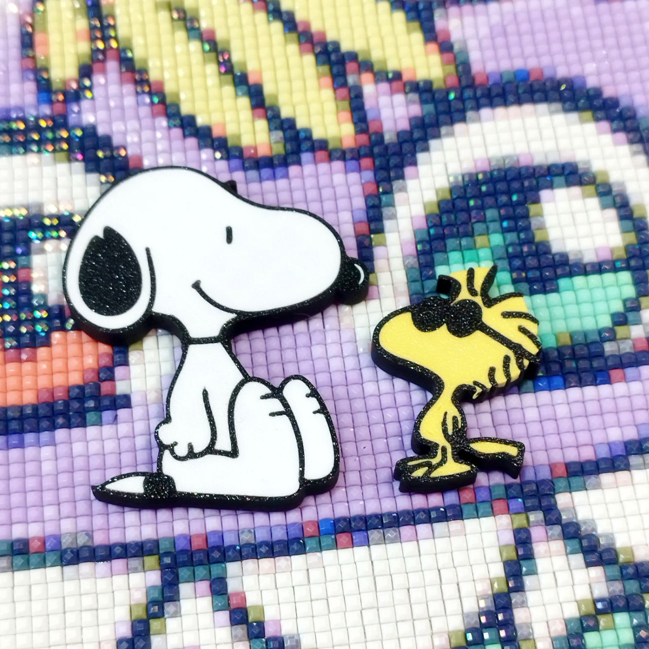 Covers Snoopy and Emilio